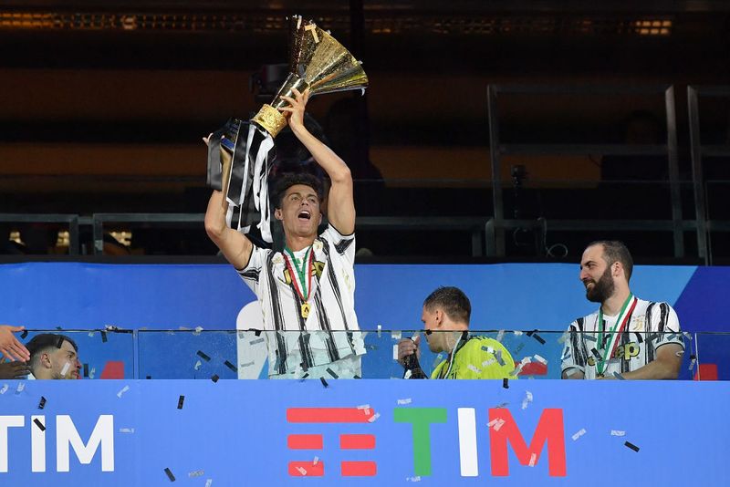 TURIN, ITALY - AUGUST 01: Cristiano Ronaldo of Juventus FC celebrates with the trophy after the Serie A match between Juventus and AS Roma at Allianz Stadium on August 1, 2020 in Turin, Italy. (Photo by Valerio Pennicino/Getty Images)