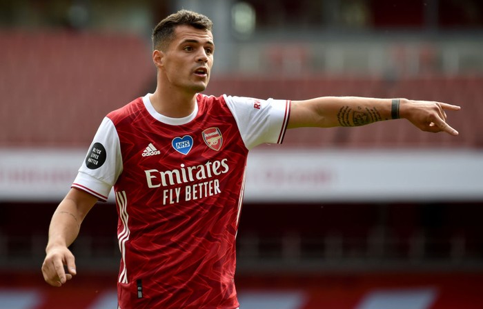 LONDON, ENGLAND - JULY 26:  Granit Xhaka of Arsenal signals during the Premier League match between Arsenal FC and Watford FC at Emirates Stadium on July 26, 2020 in London, England. Football Stadiums around Europe remain empty due to the Coronavirus Pandemic as Government social distancing laws prohibit fans inside venues resulting in all fixtures being played behind closed doors. (Photo by Rui Vieira/Pool via Getty Images)