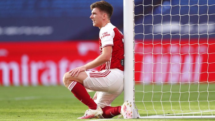 Arsenals Kieran Tierney leans against the post during the FA Cup final soccer match between Arsenal and Chelsea at Wembley stadium in London, England, Saturday, Aug.1, 2020. (Catherine Ivill/Pool via AP)