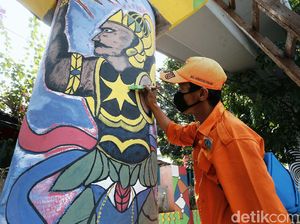 Melihat Mural Kece dari Pasukan Oranye