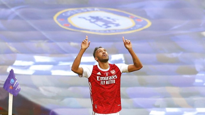 Arsenals Pierre-Emerick Aubameyang celebrates after scoring his sides second goal during the FA Cup final soccer match between Arsenal and Chelsea at Wembley stadium in London, England, Saturday, Aug.1, 2020. (Catherine Ivill/Pool via AP)
