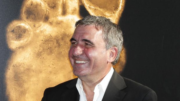 Former Romanian midfielder and Viitorul football club coach Gheorghe Hagi poses during the 2015 Golden Foot Award ceremony in Monaco on September 21, 2015. AFP PHOTO / VALERY HACHE (Photo by Valery HACHE / AFP)