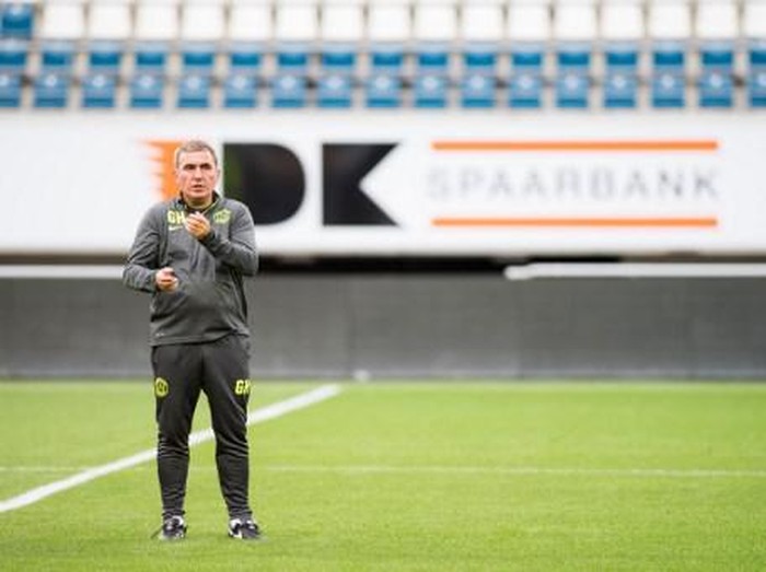 Viitorul's head coach Gheorghe Hagi gestures during a training session of Romanian team FC Viitorul Constanta, on July 27, 2016, in Gent on the eve the first leg of the third qualifying round in the Europa League competition against Belgian first league soccer team KAA Gent. (Photo by JASPER JACOBS / Belga / AFP) / Belgium OUT