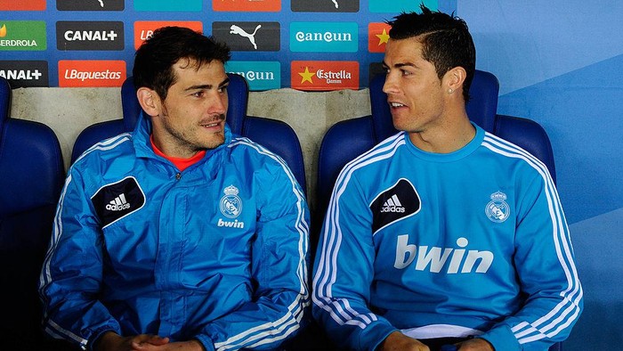 BARCELONA, SPAIN - MAY 11: Iker Casillas (L) and Cristiano Ronaldo of Real Madrid CF chat as they sit on the bench during the La Liga match between RCD Espanyol and Real Madrid CF at Cornella-El Prat Stadium on May 11, 2013 in Barcelona, Spain.  (Photo by David Ramos/Getty Images)