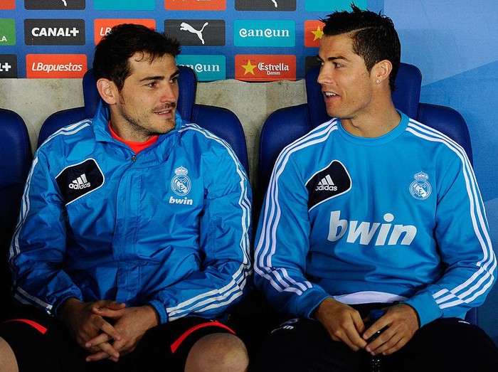 BARCELONA, SPAIN - MAY 11: Iker Casillas (L) and Cristiano Ronaldo of Real Madrid CF chat as they sit on the bench during the La Liga match between RCD Espanyol and Real Madrid CF at Cornella-El Prat Stadium on May 11, 2013 in Barcelona, Spain.  (Photo by David Ramos/Getty Images)