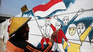 Pasukan Oranye Percantik Ibu Kota dengan Mural Kemerdekaan