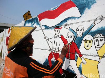 Pasukan Oranye Percantik Ibu Kota dengan Mural Kemerdekaan