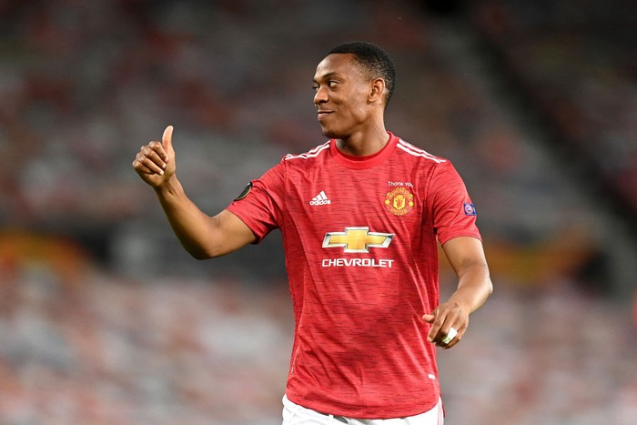 MANCHESTER, ENGLAND - AUGUST 05: Ole Gunnar Solskjaer, Manager of Manchester United embraces Anthony Martial during the UEFA Europa League round of 16 second leg match between Manchester United and LASK at Old Trafford on August 05, 2020 in Manchester, England. (Photo by Michael Regan/Getty Images)