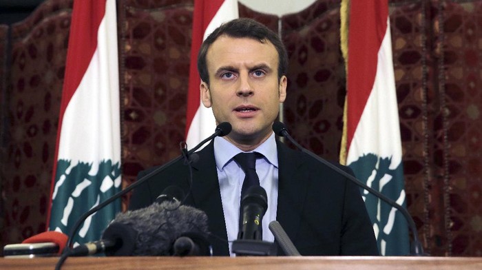 FILE - In this Tuesday, Jan. 24, 2017 file photo, French presidential candidate and former French Economy Minister Emmanuel Macron speaks during a press conference at the Government House, in downtown Beirut, Lebanon. French President Emmanuel Macron is traveling to Lebanon on Thursday Aug. 6, 2020, to offer support for the country after the massive, deadly explosion in Beirut. Lebanon is a former French protectorate and the countries retain close political and economic ties. (AP Photo/Bilal Hussein, File)