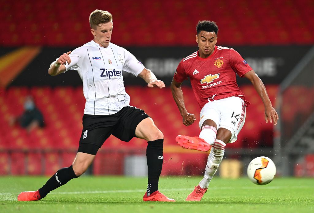 MANCHESTER, ENGLAND - AUGUST 05: Jesse Lingard of Manchester United scores his sides first goal during the UEFA Europa League round of 16 second leg match between Manchester United and LASK at Old Trafford on August 05, 2020 in Manchester, England. (Photo by Michael Regan/Getty Images)