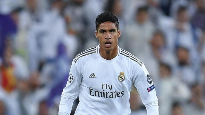 MADRID, SPAIN - FEBRUARY 26: Raphael Varane of Real Madrid CF runs with the ball during the UEFA Champions League round of 16 first leg match between Real Madrid and Manchester City at Bernabeu on February 26, 2020 in Madrid, Spain. (Photo by David Ramos/Getty Images)