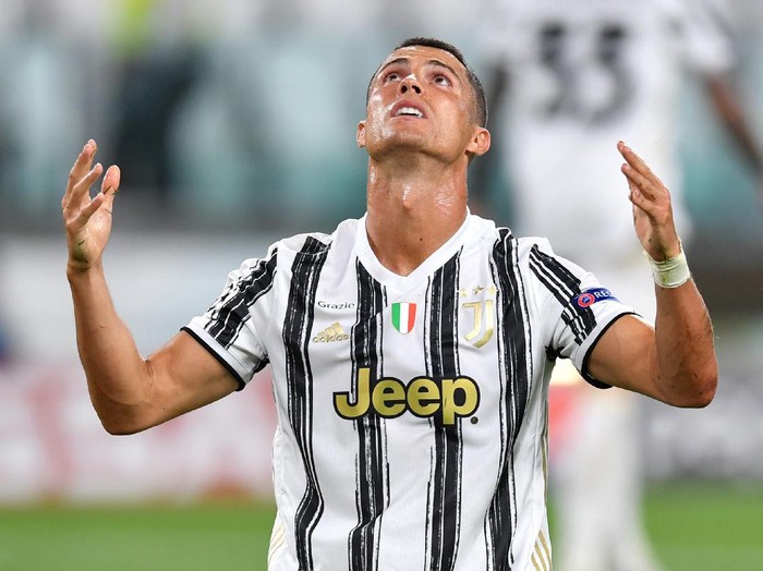 TURIN, ITALY - AUGUST 07: Cristiano Ronaldo of Juventus reacts during the UEFA Champions League round of 16 second leg match between Juventus and Olympique Lyon at Allianz Stadium on August 07, 2020 in Turin, Italy. (Photo by Valerio Pennicino/Getty Images)
