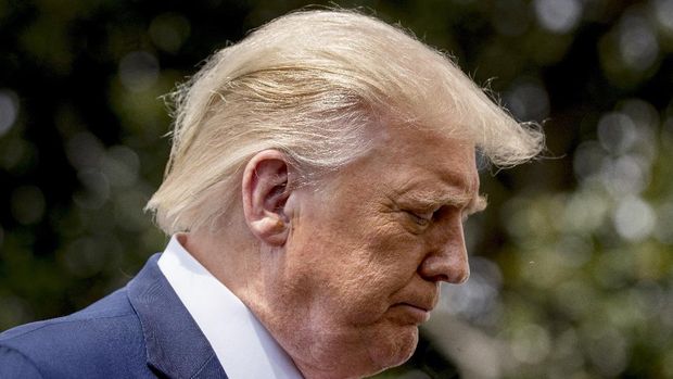 President Donald Trump pauses while speaking with members of the media before boarding Marine One on the South Lawn of the White House in Washington, Thursday, Aug. 6, 2020, for a short trip to Andrews Air Force Base, Md. and then on to Cleveland, Ohio. (AP Photo/Andrew Harnik)
