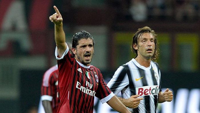 MILAN, ITALY - AUGUST 21:  Gennaro Gattuso of AC Milan and Andrea Pirlo of Juventus FC during the Berlusconi Trophy match between AC Milan and Juventus FC at Giuseppe Meazza Stadium on August 21, 2011 in Milan, Italy.  (Photo by Claudio Villa/Getty Images)