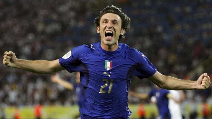 FILE - In this Tuesday, July 4, 2006 filer, Italys Andrea Pirlo celebrates his sides first goal by teammate Fabio Grosso in the extra time of the semifinal World Cup soccer match between Germany and Italy in Dortmund, Germany. World Cup winner Pirlo was named Thursday, July 30, 2020, coach of Juventus’ under-23 team, which plays in Serie C. (AP Photo/Andrew Medichini, File)