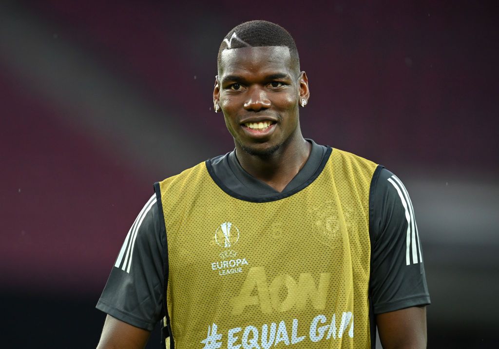 COLOGNE, JERMAN - 9 AGUSTUS: Paul Pogba dari Manchester United menyaksikan selama sesi latihan menjelang pertandingan perempat final UEFA Europa League melawan FC Kobenhavn di RheinEnergieStadion pada 9 Agustus 2020 di Cologne.  (Foto oleh Sascha Steinbach / Pool via Getty Images)