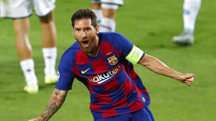 Barcelonas Lionel Messi celebrates after scoring his sides second goal during the Champions League round of 16, second leg soccer match between Barcelona and Napoli at the Camp Nou Stadium in Barcelona, Spain, Saturday, Aug. 8, 2020. (AP Photo/Joan Monfort)