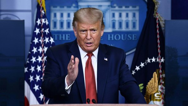 US President Donald Trump speaks to the press in the Brady Briefing Room of the White House in Washington, DC, on August 10, 2020. - Secret Service guards shot a person, who was apparently armed, outside the White House on Monday, President Donald Trump said just after being briefly evacuated in the middle of a press conference. The president was abruptly ushered out of the press event and black-clad secret service agents with automatic rifles rushed across the lawn north of the White House. Minutes later, Trump reappeared at the press conference, where journalists had been locked in, and announced that someone had been shot outside the White House grounds. Trump said he knew nothing about the identity or motives of the person shot, but when asked if the person had been armed, answered: 