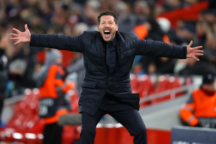 LIVERPOOL, ENGLAND - MARCH 11: Diego Simeone, Manager of Atletico Madrid celebrates after they score their second goal during the UEFA Champions League round of 16 second leg match between Liverpool FC and Atletico Madrid at Anfield on March 11, 2020 in Liverpool, United Kingdom.  (Photo by Julian Finney/Getty Images)
