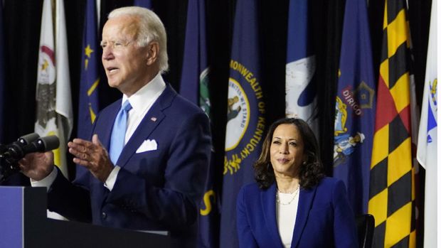 Democratic presidential candidate former Vice President Joe Biden, joined by his running mate Sen. Kamala Harris, D-Calif., speaks during a campaign event at Alexis Dupont High School in Wilmington, Del., Wednesday, Aug. 12, 2020. (AP Photo/Carolyn Kaster)