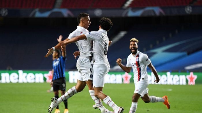 Paris Saint-Germain LISBON, PORTUGAL - AUGUST 12: Marquinhos of Paris Saint-Germain celebrates after scoring his teams first goal during the UEFA Champions League Quarter Final match between Atalanta and Paris Saint-Germain at Estadio do Sport Lisboa e Benfica on August 12, 2020 in Lisbon, Portugal. (Photo by David Ramos/Getty Images)