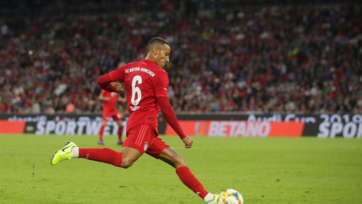 Thiago Alcantara di antara Liverpool dan Manchester City (Getty Images for AUDI/Alexander Hassenstein)