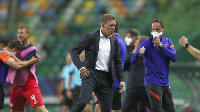 Julian Nagelsmann Leipzigs head coach Julian Nagelsmann celebrates his teams second goal during the Champions League quarterfinal match between RB Leipzig and Atletico Madrid at the Jose Alvalade stadium in Lisbon, Portugal, Thursday, Aug. 13, 2020. (Miguel A. Lopes/Pool Photo via AP)