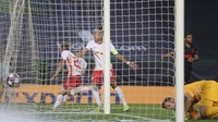 Leipzig yang tampil dominan mampu mencetak gol lebih dulu lewat sundulan Dani Olmo di menit ke-50. Miguel A. Lopes/Pool Photo via AP.