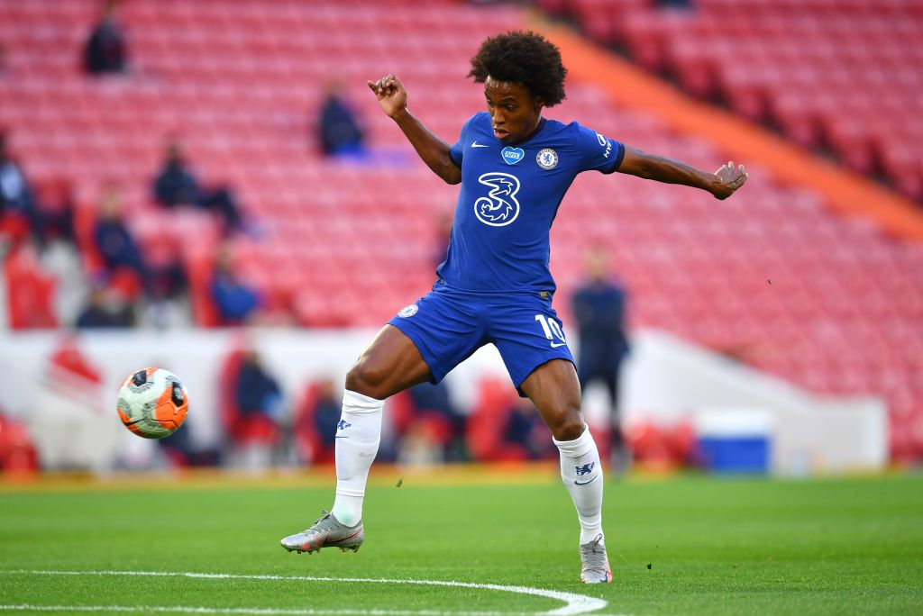 LIVERPOOL, ENGLAND - JULY 22: Willian of Chelsea controls the ball during the Premier League match between Liverpool FC and Chelsea FC at Anfield on July 22, 2020 in Liverpool, England. Football Stadiums around Europe remain empty due to the Coronavirus Pandemic as Government social distancing laws prohibit fans inside venues resulting in all fixtures being played behind closed doors. (Photo by Paul Ellis/Pool via Getty Images)