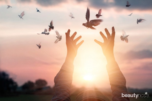 woman-praying-free-bird-enjoying-nature-sunset-background-hope-concept