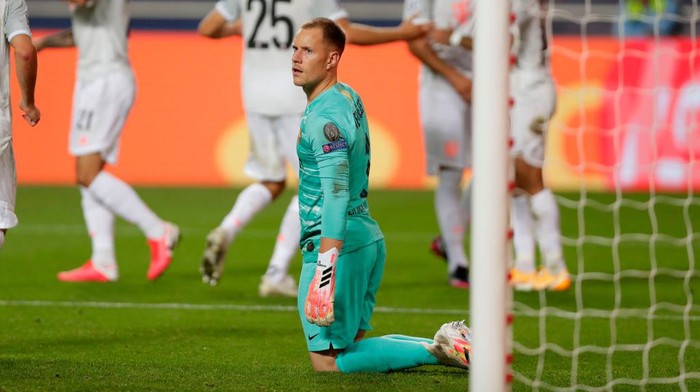 LISBON, PORTUGAL - AUGUST 14: Marc-Andre ter Stegen of FC Barcelona looks dejected after conceding during the UEFA Champions League Quarter Final match between Barcelona and Bayern Munich at Estadio do Sport Lisboa e Benfica on August 14, 2020 in Lisbon, Portugal. (Photo by Manu Fernandez/Pool via Getty Images)