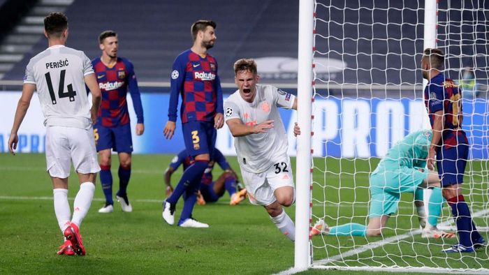 Barcelona, Bayern Munich LISBON, PORTUGAL - AUGUST 14: Joshua Kimmich of FC Bayern Munich celebrates after scoring his teams fifth goal during the UEFA Champions League Quarter Final match between Barcelona and Bayern Munich at Estadio do Sport Lisboa e Benfica on August 14, 2020 in Lisbon, Portugal. (Photo by Manu Fernandez/Pool via Getty Images)