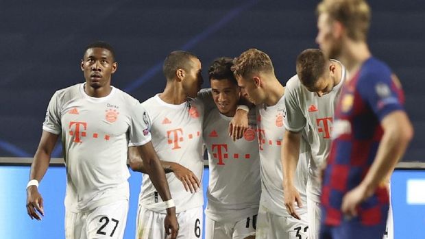 Bayern's Philippe Coutinho, center, celebrates after scoring his side's seventh goal during the Champions League quarterfinal soccer match between Barcelona and Bayern Munich in Lisbon, Portugal, Friday, Aug. 14, 2020. (Rafael Marchante/Pool via AP)