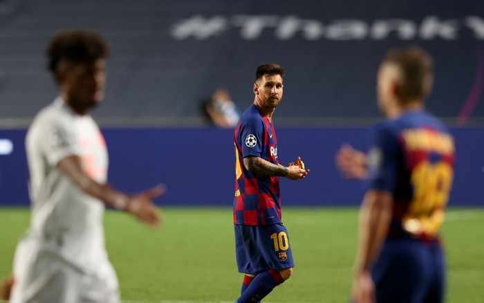 LISBON, PORTUGAL - AUGUST 14: Lionel Messi of FC Barcelona looks dejected following his teams defeat in the UEFA Champions League Quarter Final match between Barcelona and Bayern Munich at Estadio do Sport Lisboa e Benfica on August 14, 2020 in Lisbon, Portugal. (Photo by Rafael Marchante/Pool via Getty Images)