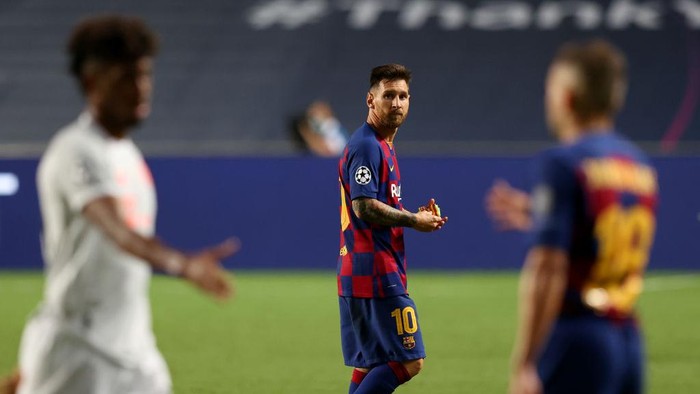 LISBON, PORTUGAL - AUGUST 14: Lionel Messi of FC Barcelona looks dejected following his teams defeat in the UEFA Champions League Quarter Final match between Barcelona and Bayern Munich at Estadio do Sport Lisboa e Benfica on August 14, 2020 in Lisbon, Portugal. (Photo by Rafael Marchante/Pool via Getty Images)