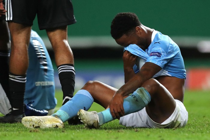 LISBON, PORTUGAL - AUGUST 15: Raheem Sterling of Manchester City looks dejected following his teams defeat in the UEFA Champions League Quarter Final match between Manchester City and Lyon at Estadio Jose Alvalade on August 15, 2020 in Lisbon, Portugal. (Photo by Miguel A. Lopes/Pool via Getty Images)