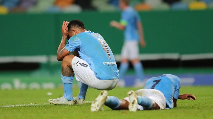 Manchester City LISBON, PORTUGAL - AUGUST 15: Gabriel Jesus of Manchester City and Raheem Sterling of Manchester City look dejected during the UEFA Champions League Quarter Final match between Manchester City and Lyon at Estadio Jose Alvalade on August 15, 2020 in Lisbon, Portugal. (Photo by Miguel A. Lopes/Pool via Getty Images)