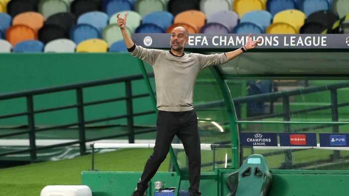 LISBON, PORTUGAL - AUGUST 15: Pep Guardiola, Manager of Manchester City reacts during the UEFA Champions League Quarter Final match between Manchester City and Lyon at Estadio Jose Alvalade on August 15, 2020 in Lisbon, Portugal. (Photo by Miguel A. Lopes/Pool via Getty Images)