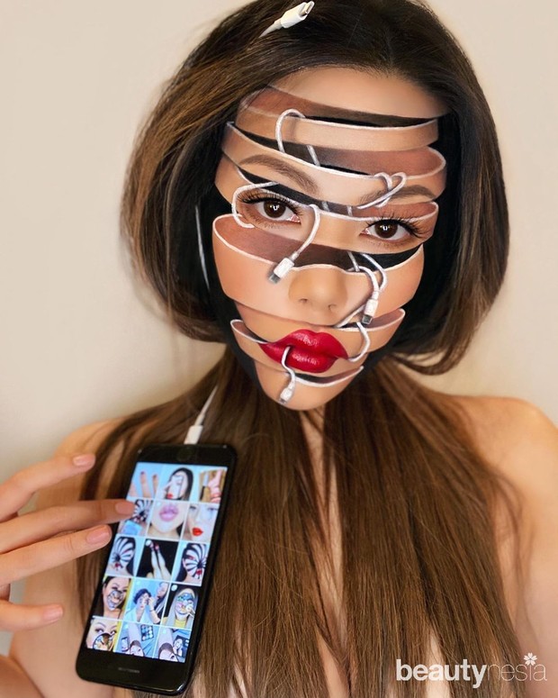 Hasil Makeup Ilusi Wajah ala Mimi Choi/sumber: www.instagram.com/mimles/ Potret makeup ilusi Mimi Choi yang menunjukkan irisan pada wajahnya karena terlilit earphone.