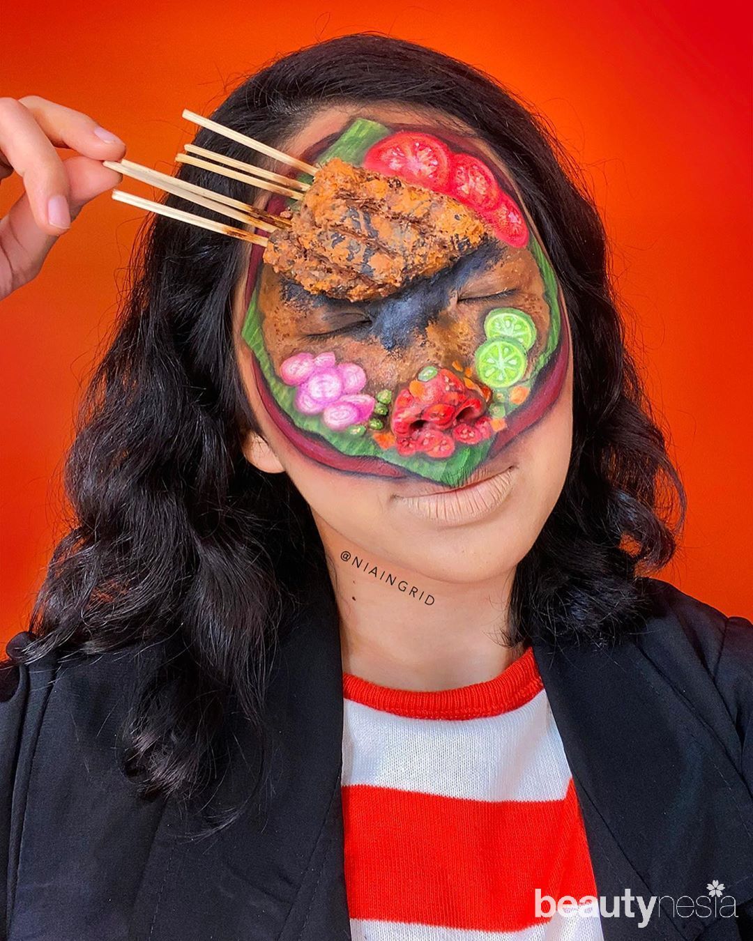 Content creator Nia inggrid face painting