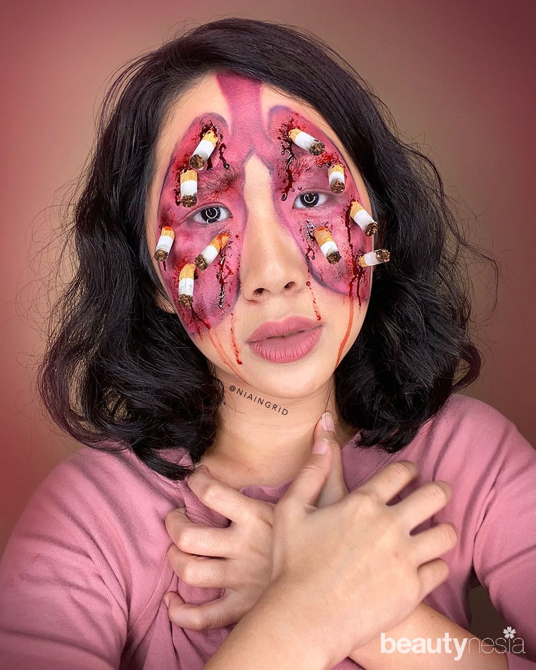 Content creator Nia inggrid face painting