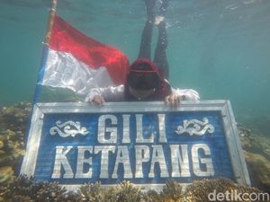 Bendera Merah Putih Membentang di Bawah Laut Pulau Gili Ketapang