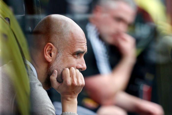 WATFORD, ENGLAND - JULY 21: Pep Guardiola, Manager of Manchester City looks on from the bench prior to the Premier League match between Watford FC and Manchester City at Vicarage Road on July 21, 2020 in Watford, England. Football Stadiums around Europe remain empty due to the Coronavirus Pandemic as Government social distancing laws prohibit fans inside venues resulting in all fixtures being played behind closed doors. (Photo by Adrian Dennis/Pool via Getty Images)