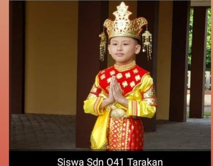 Seorang anak dengan baju Tidung menjadi model uang baru (dok. Istimewa)