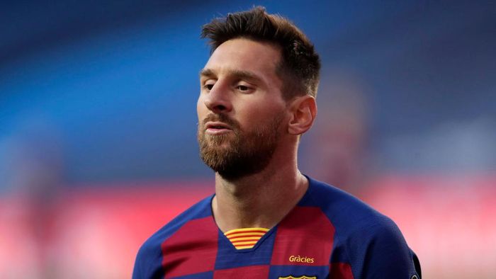 Lionel Messi LISBON, PORTUGAL - AUGUST 14: Lionel Messi of FC Barcelona looks on during the UEFA Champions League Quarter Final match between Barcelona and Bayern Munich at Estadio do Sport Lisboa e Benfica on August 14, 2020 in Lisbon, Portugal. (Photo by Manu Fernandez/Pool via Getty Images)