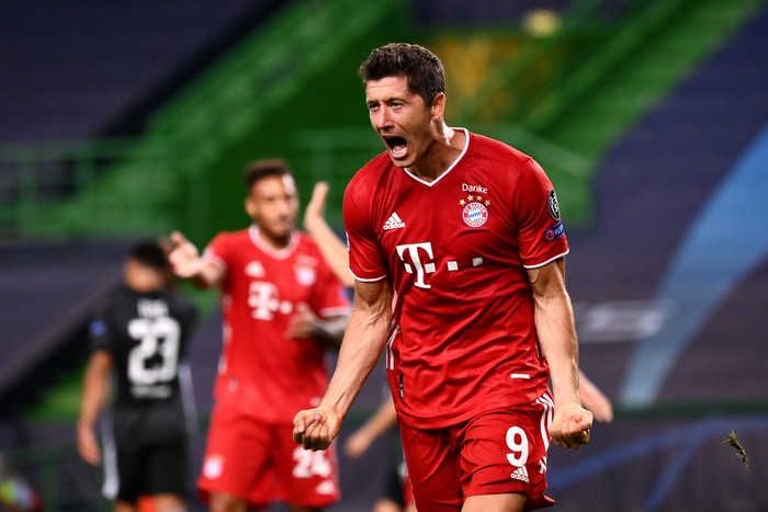 bayern munich robert lewandowski liga champions LISBON, PORTUGAL - AUGUST 19: Robert Lewandowski of Bayern Munich celebrates after scoring his team's third goal during the UEFA Champions League Semi Final match between Olympique Lyonnais and Bayern Munich at Estadio Jose Alvalade on August 19, 2020 in Lisbon, Portugal. (Photo by Franck Fife/Pool via Getty Images)
