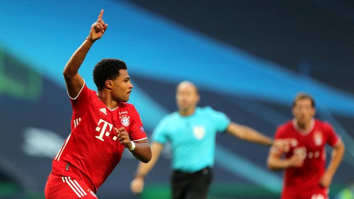 LISBON, PORTUGAL - AUGUST 19: Serge Gnabry of Bayern Munich celebrates after scoring his teams first goal during the UEFA Champions League Semi Final match between Olympique Lyonnais and Bayern Munich at Estadio Jose Alvalade on August 19, 2020 in Lisbon, Portugal. (Photo by Miguel A. Lopes/Pool via Getty Images)