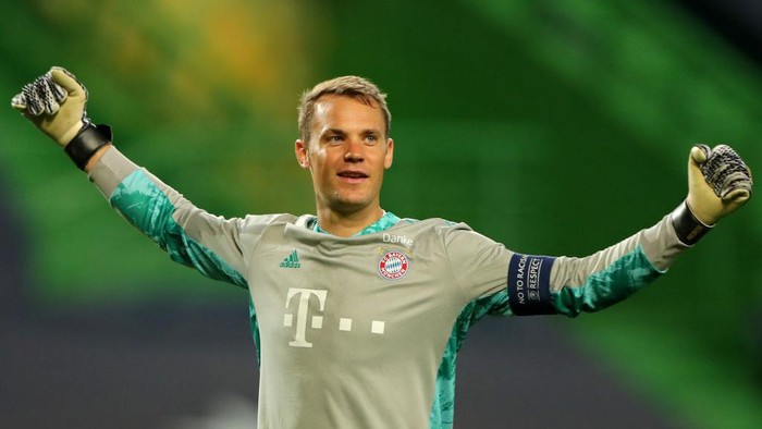 Manuel Neuer LISBON, PORTUGAL - AUGUST 19: Manuel Neuer of Bayern Munich celebrates after his teammate Robert Lewandowski of Bayern Munich (not pictured) scored their teams third goal during the UEFA Champions League Semi Final match between Olympique Lyonnais and Bayern Munich at Estadio Jose Alvalade on August 19, 2020 in Lisbon, Portugal. (Photo by Miguel A. Lopes/Pool via Getty Images)