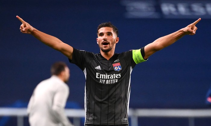 LISBON, PORTUGAL - AUGUST 15: Houssem Aouar of Olympique Lyon celebrates following his teams victory in the UEFA Champions League Quarter Final match between Manchester City and Lyon at Estadio Jose Alvalade on August 15, 2020 in Lisbon, Portugal. (Photo by Franck Fife/Pool via Getty Images)