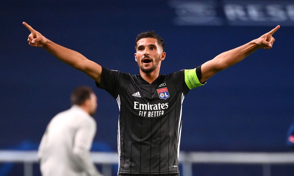 LISBON, PORTUGAL - AUGUST 15: Olympique Lyon's Houssem Aouar celebrates his team's victory in the UEFA Champions League quarter-final match between Manchester City and Lyon at the Jose Alvalade Stadium on August 15, 2020 in Lisbon, Portugal.  (Photo by Franck Fife / Pool via Getty Images)